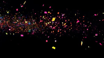 Poster - Colorful confetti explodes against a black backdrop, capturing the energy of a celebration. Swirling and falling in a festive pattern, this image conveys the fun of a party or event