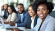 © loxia stock image - Diverse team of business professionals smiling and looking at camera.