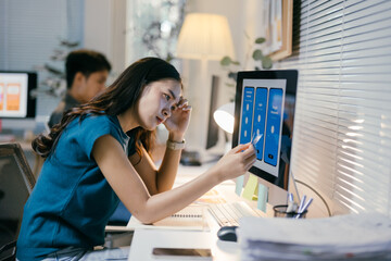 Poster - Young female ui/ux designer is feeling stressed and having a hard time finding a solution for her mobile app design project