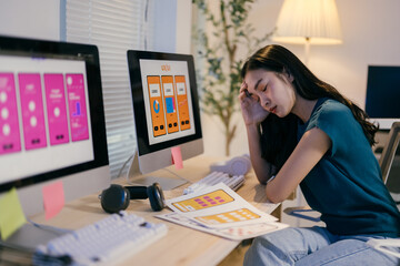 Aufkleber - Young woman is holding her head, dealing with a painful headache while working on a challenging ux/ui design project at her desk