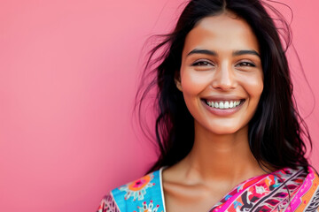 a smiling woman wearing a colorful dress, exuding happiness and confidence. the vibrant and cheerful