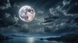 © NafisaNajmin - A luminous full moon illuminates a cloudy night sky,
