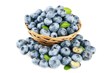 Wall Mural - Blueberries with green leafs in basket isolated on white background