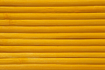 Wall Mural - close up of bamboo mat made of yellow sticks