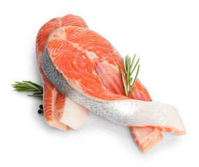 Two fresh salmon steaks, peppercorns and rosemary isolated on white