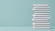 © sunchai - Stack of books on a light background