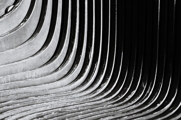 Poster - A classic curved bench in black and white.