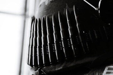 Poster - A close-up view of a helmet with multiple knives stuck in it, perfect for military or action-themed images.