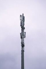 5G tower in gloomy clouds