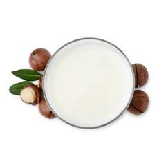 Wall Mural - Glass of macadamia milk and nuts isolated on white, top view