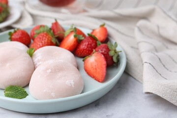 Sticker - Delicious mochi, strawberries and mint on white marble table, closeup