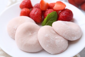 Sticker - Delicious mochi and strawberries on table, closeup