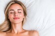 © Konstiantyn Zapylaie - Serene beauty in restful sleep on soft white bedding