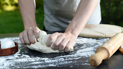 hands with dough close-up