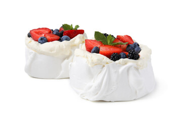 Poster - Pavlova cake (meringue dessert) with whipped cream, fresh berries and mint isolated on white