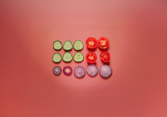Poster - Sliced cucumbers, tomatoes, and red onions neatly arranged on a vibrant pink background.