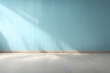 © NadenDesign - Modern blank room blue turquoise wall with sunlight at window, blank room background for use.
