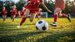 © ryker - High school girls soccer team playing match, showcasing teamwork and athleticism on field. focus is on ball as players sprint towards it, capturing excitement of game