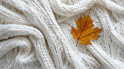 Leinwandbilder - Knitted white scarf pattern background with autumn maple leaf Close up Top view : Generative AI