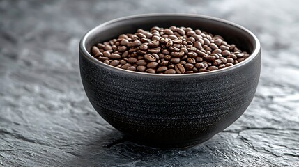 Poster - Coffee beans in black bowl on grey slate background Close up : Generative AI