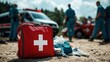 © Old Man Stocker - First Aid Kit for Medical Services. First aid kit stands prominently on the ground, symbolizing emergency medical services. Paramedics are visible in the background, prepared for any situation.