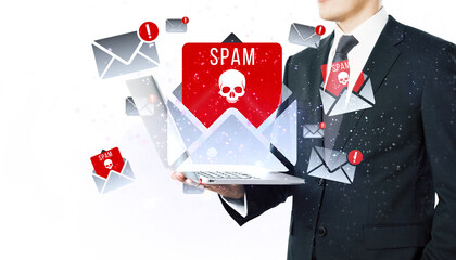 Leinwandbilder - Businessman holding laptop with spam email alerts, white background