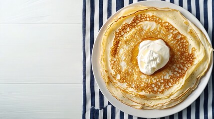 Poster - Thin crepes or pancakes with butter honey and sour cream on a striped textile navy blue and white background Top view Copy space : Generative AI
