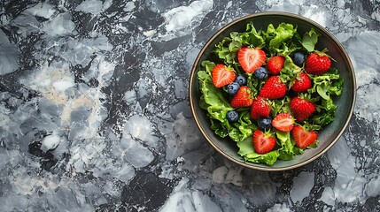 Poster - Fresh green salad with strawberries and edible flowers in a bowl Marble background : Generative AI