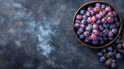 Poster - Grape in bowl on a black stone background Copy space : Generative AI