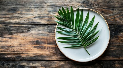 Poster - White plate with palm leaf on wooden background Copy space Top view : Generative AI