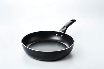 A new black non-stick frying pan on a white background.