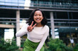 © Westend61 - Smiling woman showing peace sign