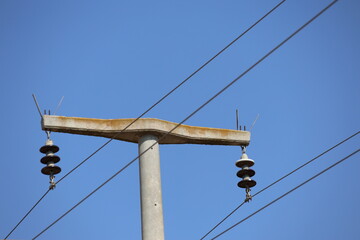 power lines against blue sky