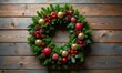 © Vitalii - Christmas wreath with balls, cones and garland on rustic wooden background with copy space