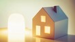© Aris Suwanmalee - A cozy paper house model illuminated softly, representing warmth and comfort in home decor. Ideal for creativity and design themes.