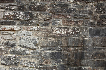 old dilapidated stone wall as a background