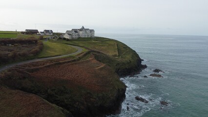 Coastal cliff with buildings and ocean view