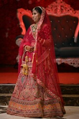 indian bride in red bridal lehenga