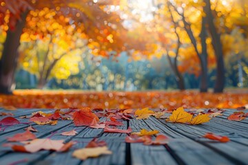 An empty wooden table top with a blurred autumn background, perfect for displaying or showcasing products in a fall-themed design