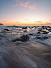 Wall Mural - beautiful dawn view around rocky beach shore.