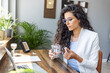 © Dragana Gordic - Professional Woman Taking a Break in Modern Office Setting