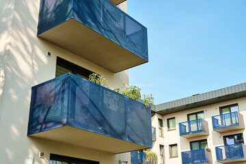 Wall Mural - New apartment building facade with balconies. Residential complex in Wroclaw, Poland. Modern city architecture. Real estate market