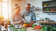 © ibooM - A joyful middle-aged couple laughs together while preparing a meal in their cozy kitchen