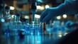 © Rinowz - A close-up of a researcher conducting experiments with drug compounds in a blue health lab