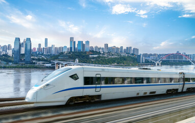 Fototapete - High-speed rail speeds on Bridges and the modern city skyline of chongqing, China