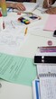 © Susana - Various math activities on the table, some notebooks and markers