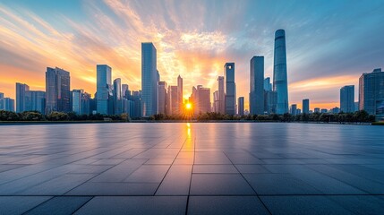 Breathtaking sunset illuminates modern city skyline, reflecting golden light on tranquil water and sleek urban plaza, showcasing architectural marvels against vibrant sky.