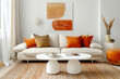 © Vadim Andrushchenko - Minimalist interior design of modern living room. Beige fabric sofa with bright orange pillows.