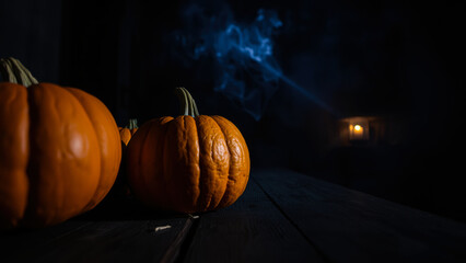 Sticker - three pumpkins sit on a dark wooden surface with blue smoke rising the background