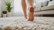 © Nadin Faust - close-up of a woman's feet walking on soft plush white carpet in a cozy living room, focus on texture and details, blurred background for text space or design use